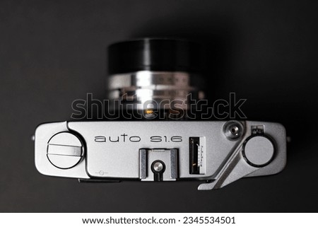 This high-resolution stock photo depicts a vintage rangefinder camera