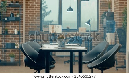 Empty office space with data documents, desk filled with reports and analytics research on files. Startup meeting boardroom used for global corporate development, firm partnership.