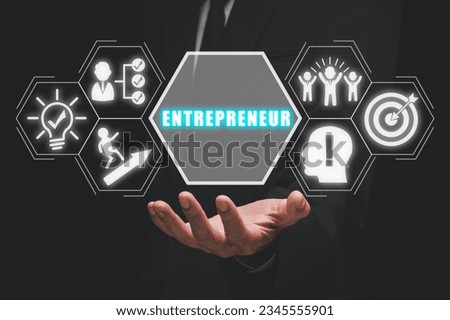 Entrepreneur concept, Business person hand holding entrepreneur icon on virtual screen.