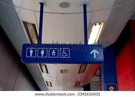 Toilet signage in transportation hub
