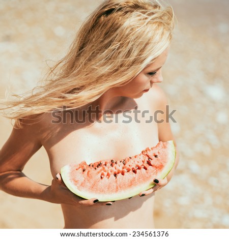 beautiful girl, blonde, holds a water-melon. summer time. Hipster Style. Photo with instagram style filters