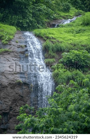 Aerial footage of a monsoon season waterfall near Pune India. Monsoon is the annual rainy season in India from June to September. Royalty-Free Stock Photo #2345624319