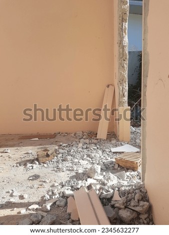 Demolition of residential buildings, leveling cracked walls.
