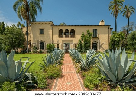 Large mansion and grouds in San Marino California neighborhood. Royalty-Free Stock Photo #2345633477