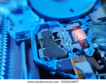 Part components of CD DVD writer. Macro photography of laptop CD ROM.