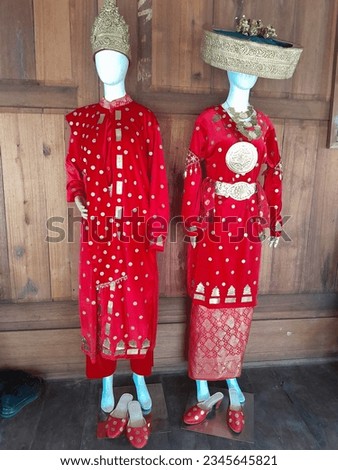 Photo of Typical Bridal Clothing of Musi Banyuasin Regency South Sumatra Indonesia