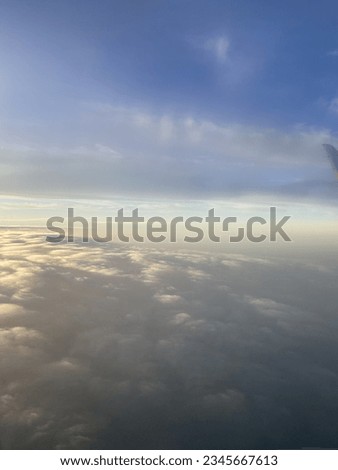 A beautiful view of the clouds captured from the airplane window