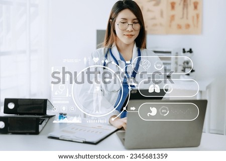 Asian Dctor work on digital tablet healthcare doctor technology tablet using computer in laboratory study with virtual icon
