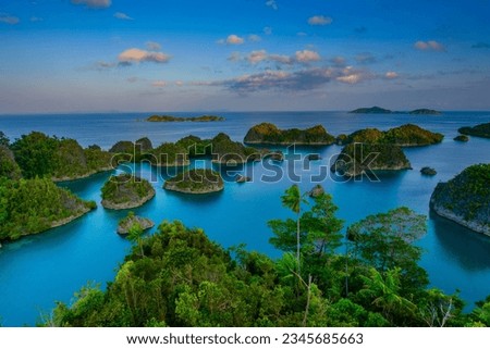 Indonesia superb sunset in Papua Raja-Ampat-Papua Royalty-Free Stock Photo #2345685663