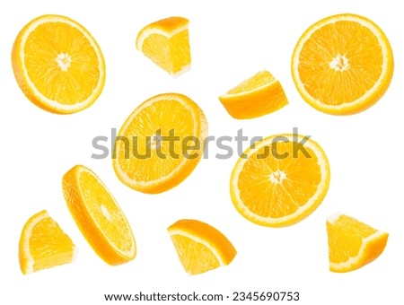 Fresh oranges pattern. Round slices and pieces fruits fly and levitation on white background, closeup, isolated. Summer fresh citrus fruits as design element for advertising, card, poster. Royalty-Free Stock Photo #2345690753