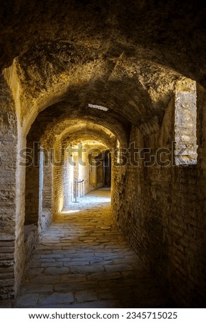 The large corridor under the Italica Amphitheater space dedicated space for distributing spectators throughout the three caveas. Roman city of Italica, located in Santiponce, Seville, Andalusia, Spain