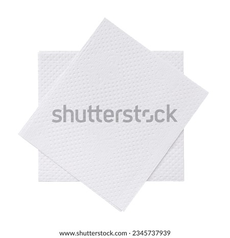 Top view of two folded pieces of white tissue paper or napkin in stack is isolated on white background with clipping path. Royalty-Free Stock Photo #2345737939