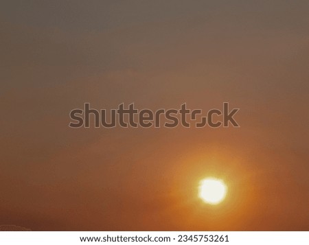 abstract natural sun flare on the orange sky