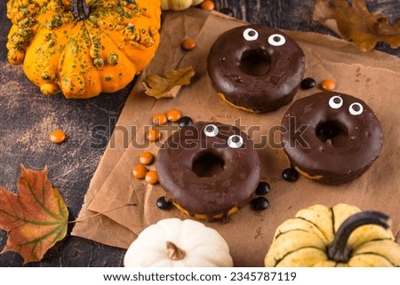 Halloween festive donuts with eyes.