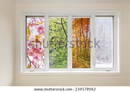 Window in home interior with view of four seasons Royalty-Free Stock Photo #234578962