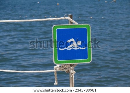 Caution Swim Zone. Notice Allowed Swimmer Pictogram. Permit Green Squere Symbol. Beach Allowed People Swim. Sign on the beach.