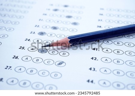 Answer sheets with Pencil drawing fill to select choice : education concept Royalty-Free Stock Photo #2345792485