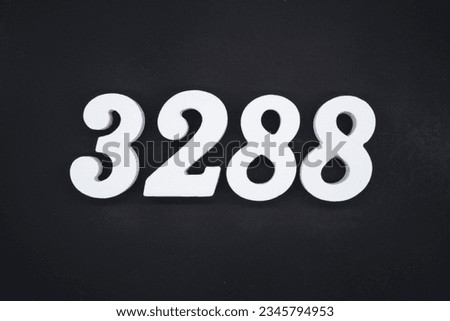 Black for the background. The number 3288 is made of white painted wood.