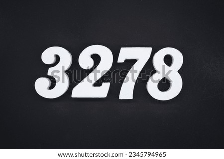 Black for the background. The number 3278 is made of white painted wood.