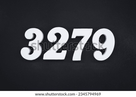 Black for the background. The number 3279 is made of white painted wood.
