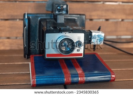 instant Camera Vintage style wood Background