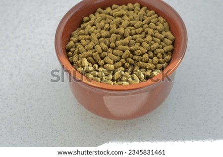 Pet food, special food for pet rodents, transmitting food care and well-being to your furry friend. Nutritious and balanced food for pet rodents, providing a healthy and tasty diet.