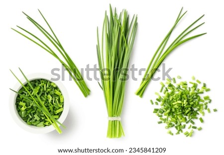 fresh green herbs: chives in a bunch, blades, chopped loose pieces, in a heap and a bowl, isolated cooking, nutrition, diet, farm or garden design elements, set or collection, cut-out on white Royalty-Free Stock Photo #2345841209