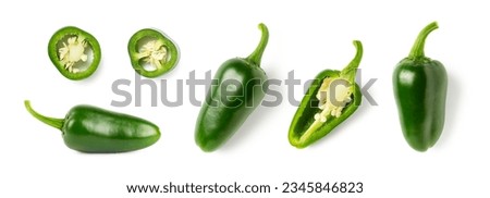 set or collection of green hot spicy jalapenos or chili peppers, whole, half and slices  sliced isolated over a white background, top and side view, organic green food design elements