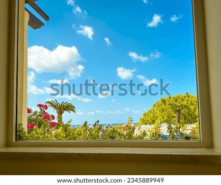 Looking out of the window at the beauty of the Mediterranean landscape