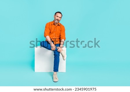 Full body length photo of candid professional expert representative director sit white box businessman isolated on blue color background