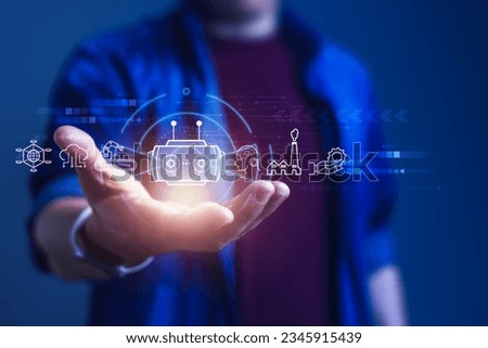 Businessman seamlessly integrates Robotic Process Automation (RPA) into daily workflow, the transformation of traditional processes as he harness the power of RPA Royalty-Free Stock Photo #2345915439