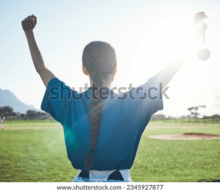 Sports, success and woman back with baseball medal at a stadium for victory, celebration or award. Softball, reward and female winner celebrating fitness target, match or competitive game performance