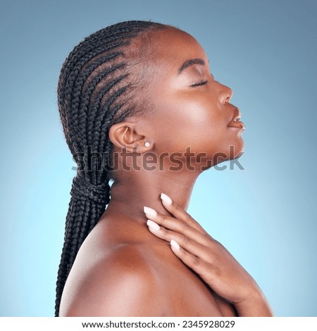 Skin care, beauty and face of black woman with dermatology, makeup and manicure. Profile of African person on blue background with cosmetics, shine and facial glow with hand for soft touch in studio