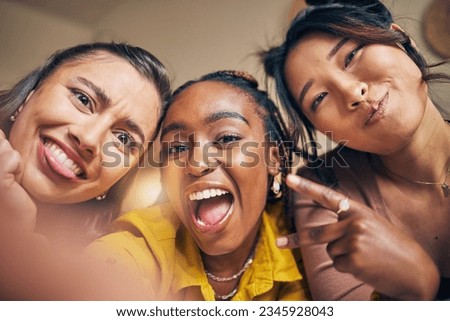 Friends, selfie and women happy, crazy and bond in a living room at home together on the weekend. Portrait, emoji and people with diversity pose for profile picture, blog or social media memory post