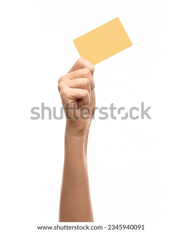 shopping, finance and people concept - close up of hand with plastic credit card on white background Royalty-Free Stock Photo #2345940091