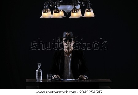 portrait of the sheriff in the office at the table Royalty-Free Stock Photo #2345954547