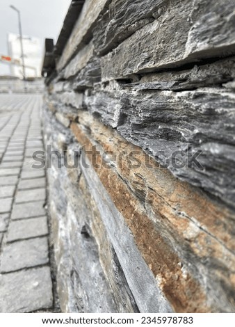 Granite wall decoration in different layer, stone wall texture  