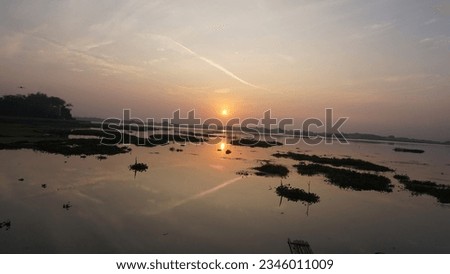 Beautiful view of the sunrise over the reservoir