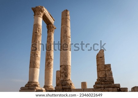 Amman Citadel hill with ruins of Roman Hercules Temple with its cloumns, Jordan against blue sky Royalty-Free Stock Photo #2346022649