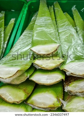 Asian street market selling fresh Aloe Vera leaves in Indonesia