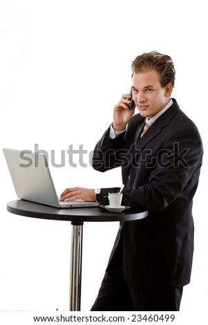 Businessman working on laptop and calling on phone, white background.