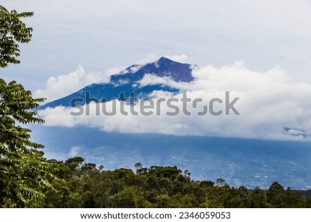 Mount Kerinci (Gunung Kerinci) is the highest mountain in Sumatra, the highest volcano and the highest peak in Indonesia with an altitude of 3805 masl, located in the Kerinci Seblat National Park area Royalty-Free Stock Photo #2346059053