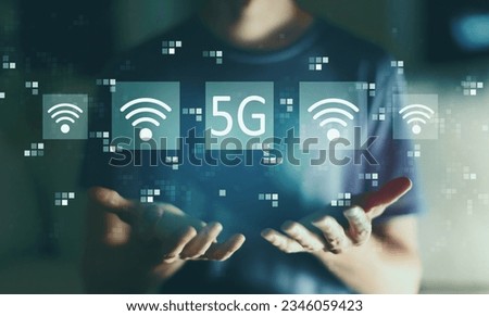 5G network with young man in the night Royalty-Free Stock Photo #2346059423