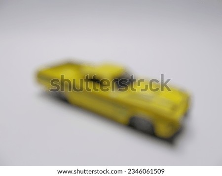 Defocused photo of a child's toy car