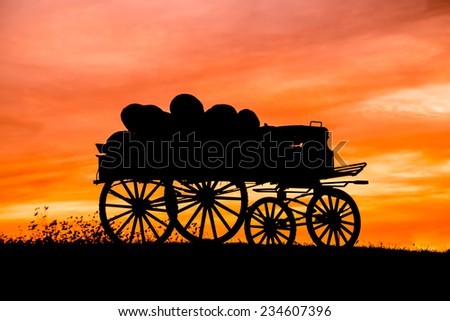 Wagon full of pumpkins silhouette