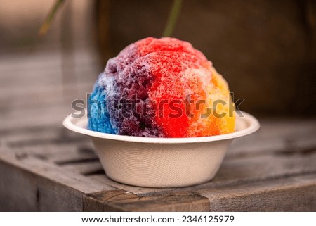 Shave ice - hawaiian shaved ice dessert. Close up of traditional local Hawaii dessert food. Royalty-Free Stock Photo #2346125979