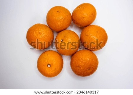 Top of View Some fresh oranges. Isolated on white background.