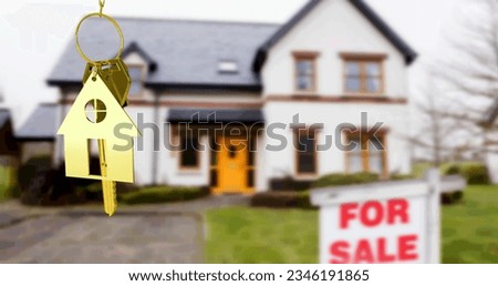 Image of gold house key fob and key, hanging in front of blurred house with for sale sign. property business, home and finance concept digitally generated image.