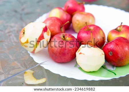 Peeled apple on plate