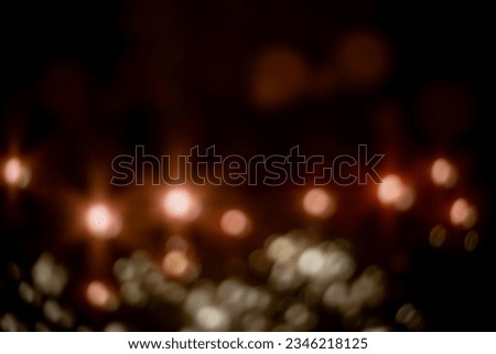 Bokeh captured by computer monitors and light bulbs Make a blurred image for various festivals and use it as a background image at a party.